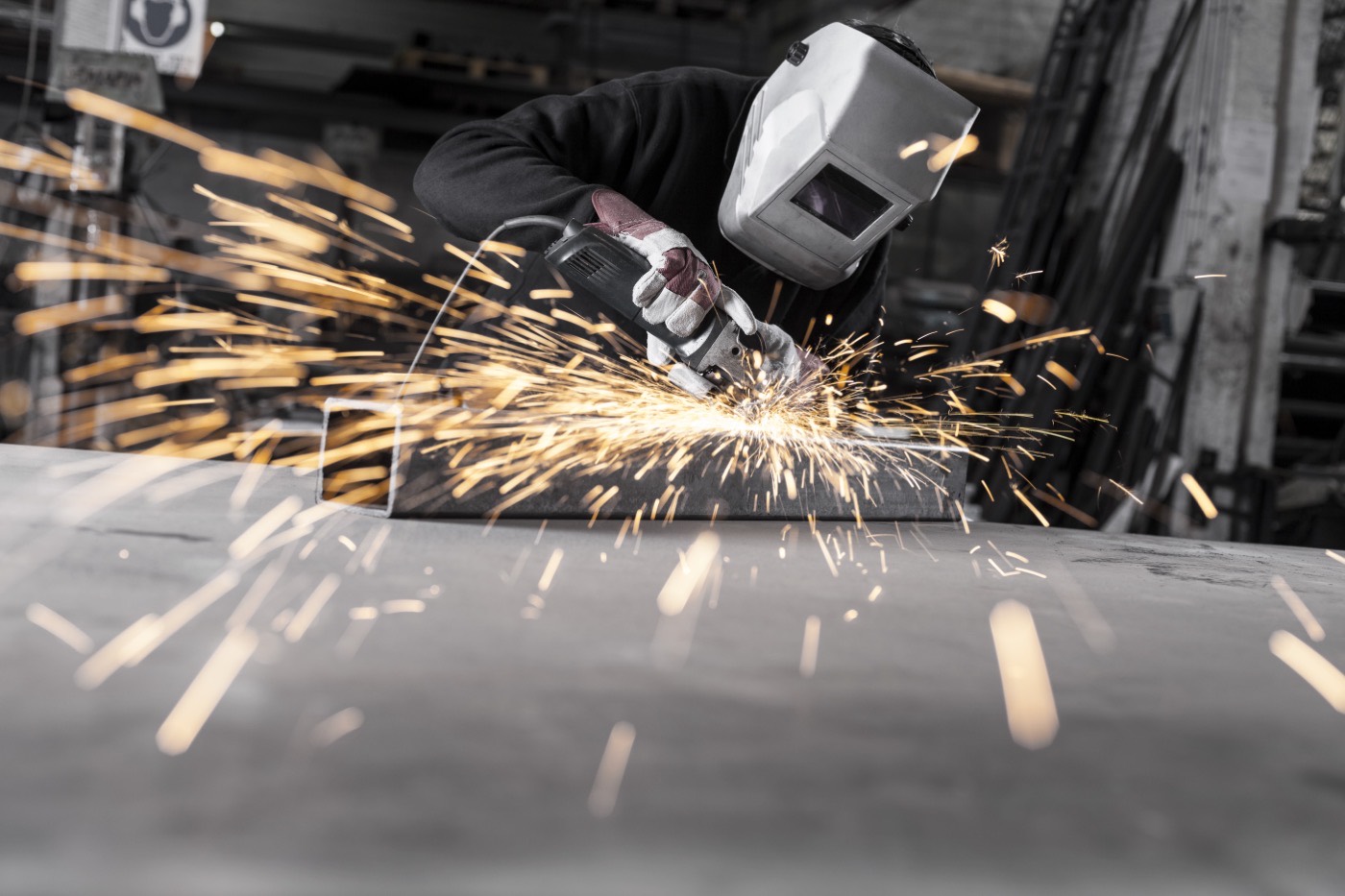 A craftsman at work in a metal shop